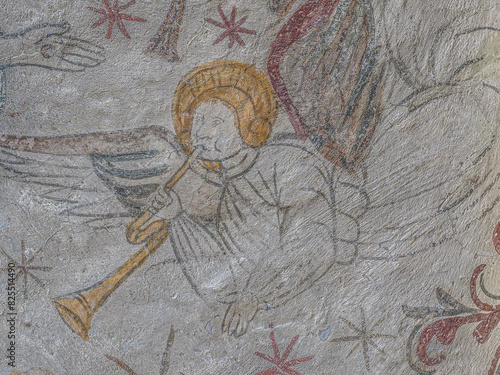 Obraz na płótnie angel playing the trumpet at the Last Judgment on a mural painting on mortar w salonie
