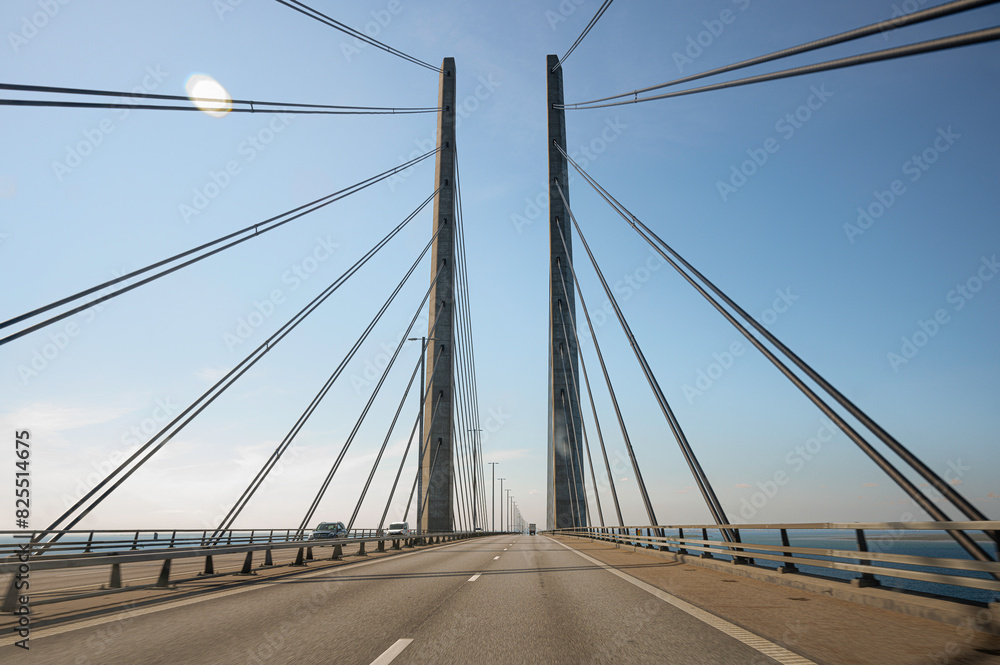 Pylons and wires on the Øresund Bridge between Sweden and Denmark Pylons and wires on the Øresund Bridge between Sweden and Denmark