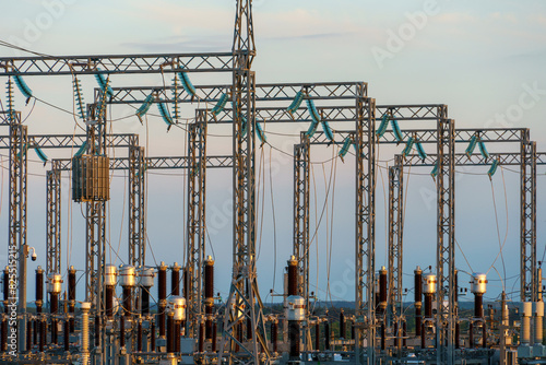 Power transmission lines are high-voltage towers near a large power plant. Energy infrastructure of Ukraine.