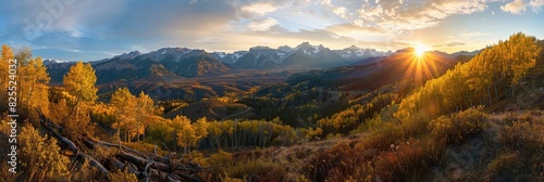 October Landscape. Sunrise View of Autumn Aspen Trees at Dallas Divide Overlooking Rocky Mountains photo