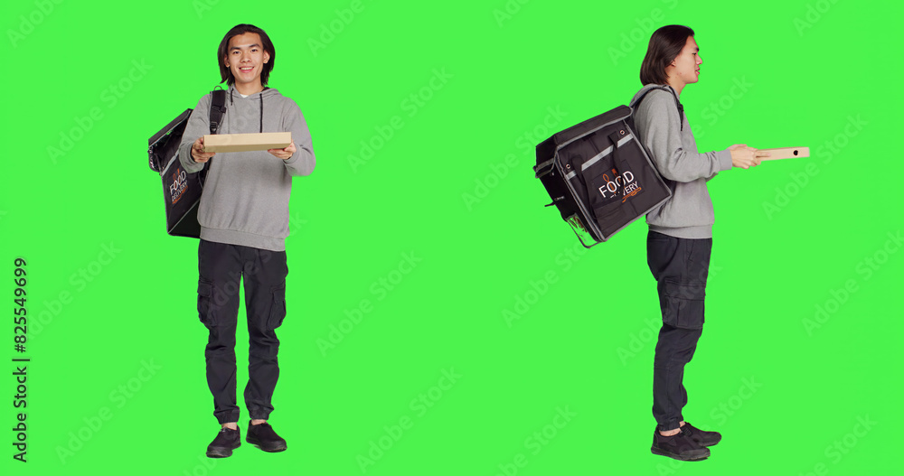 Asian man delivering food for clients using thermal bag over full body greenscreen, carrying meal orders. Deliveryman employee posing on camera, providing takeaway aliments. Asian man delivering food for clients using thermal bag over full body greenscreen, carrying meal orders. Deliveryman employee posing on camera, providing takeaway aliments.