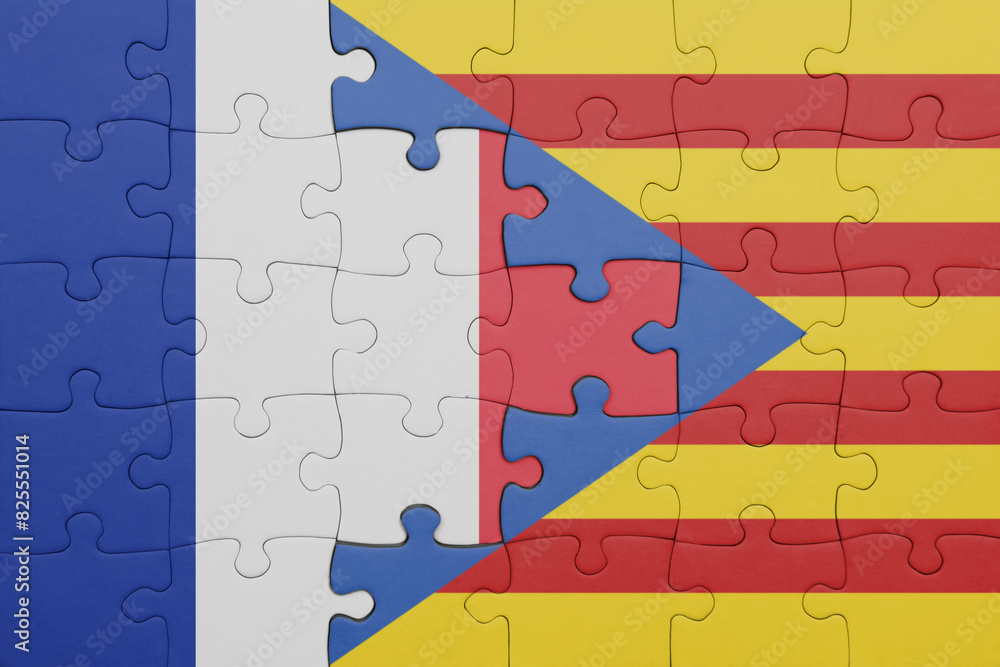 puzzle with the colourful national flag of catalonia and flag of france ...