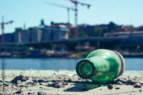 Photography Close up of a empty bottle in city