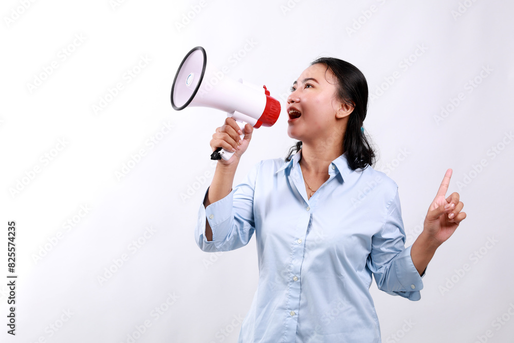 Happy beautiful Asian woman talking on megaphone to sideways while pointing other side. isolated on white background Happy beautiful Asian woman talking on megaphone to sideways while pointing other side. isolated on white background