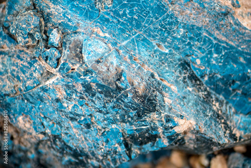 Bilde på lerret A blue natural stone with lots of details closeup, a piece of volcanic origin stone