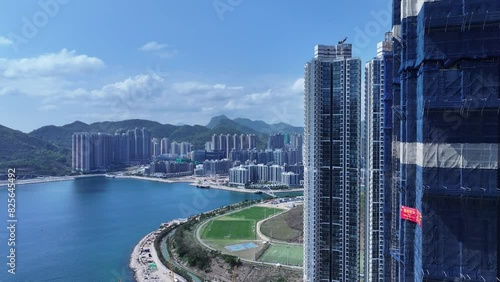 A new town surrounded by reclaimed land and high-rise buildings with construction Commercial and residential community in Lohas Park Tseung Kwan O Tiu Keng Leng Clear Water Bay Kowloon Hong Kong  photo