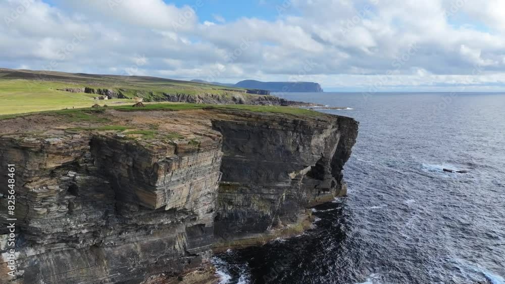 Aerial View of Picturesque Shoreline of Scotland UK, Cliffs, Caves and Green Pastures Above Sea Waves Aerial View of Picturesque Shoreline of Scotland UK, Cliffs, Caves and Green Pastures Above Sea Waves