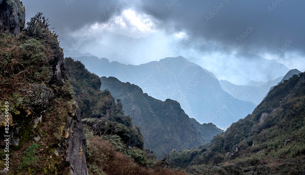 Looking at Fansipan mountain peak at an altitude of 3143m in Sa Pa town, Lao Cai province, Vietnam Looking at Fansipan mountain peak at an altitude of 3143m in Sa Pa town, Lao Cai province, Vietnam