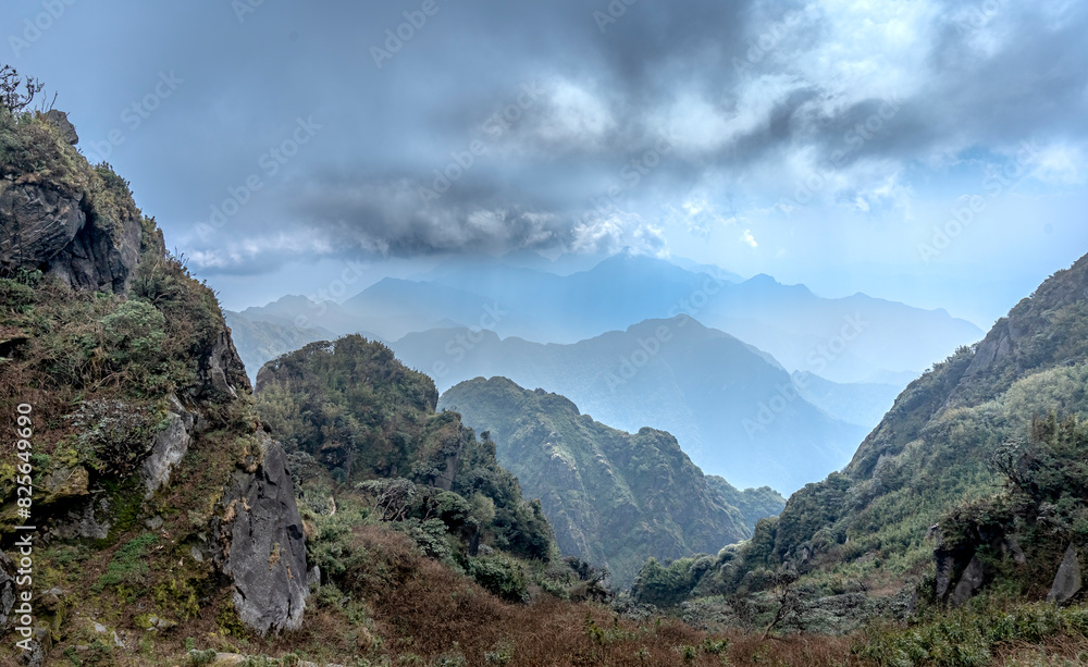 Looking at Fansipan mountain peak at an altitude of 3143m in Sa Pa town, Lao Cai province, Vietnam Looking at Fansipan mountain peak at an altitude of 3143m in Sa Pa town, Lao Cai province, Vietnam