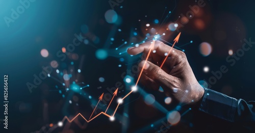 The merchant uses his finger to touch the growth graph on the virtual screen,...