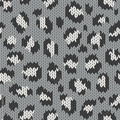 Knitted animal skin seamless pattern. Fabric imitation vector background. Flat style knit wallpaper with leopard print. Cute design for gift wrap, paper, textile