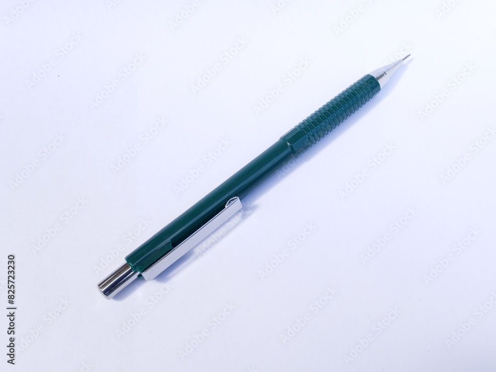 Green and silver colored mechanical pencils for sketching and drawing