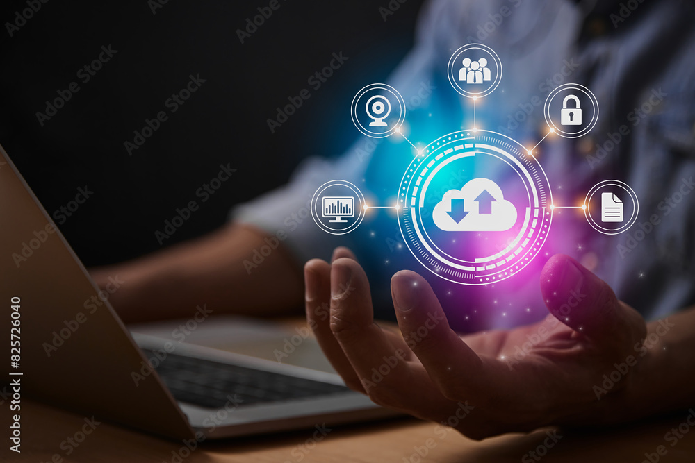 Fototapeta premium Blue Magenta Cloud Storage Network or Cloud Computing Technology Concept. Cloud,Graph,Lock,Document and HUD Icon on Business's Hand with Laptop Computer