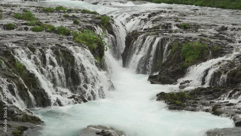 Bruarfoss waterfall in summer season in Iceland. Famous nature landscape background Bruarfoss waterfall in summer season in Iceland. Famous nature landscape background