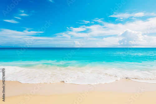 Beach with blue sky and white clouds above it. © VISUAL BACKGROUND