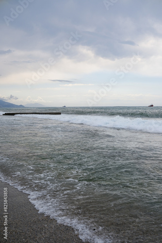 Mediterranean seaside coast in stormy weather.