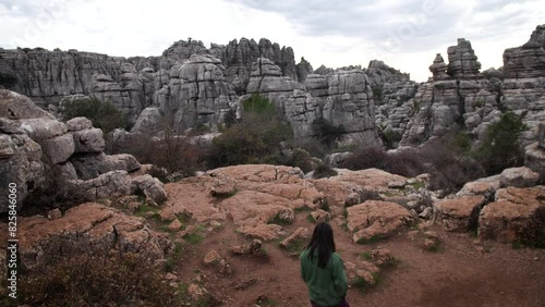 Woman in Torcal mountain, walking and wandering around, Antequera, Andalusia, Spain. High quality 4k footage