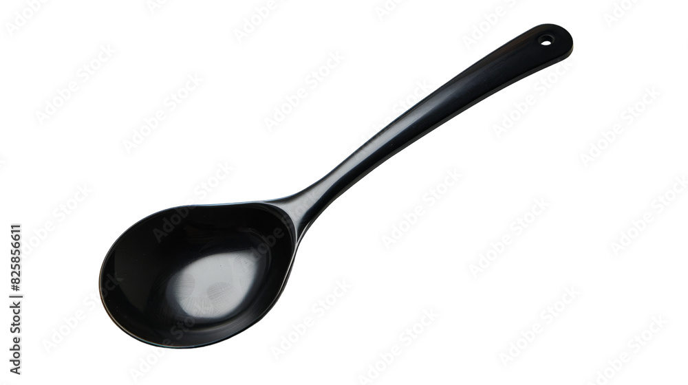 A black spoon resting on a clean white surface A black spoon resting on a clean white surface