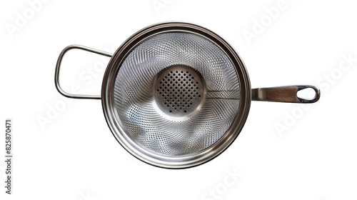 A metal strainer with a wooden handle placed on a kitchen countertop