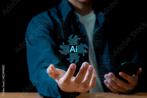 Artificial intelligence AI shaped as an electronic circuit symbol. on the hand of a businessman Innovative learning technology	