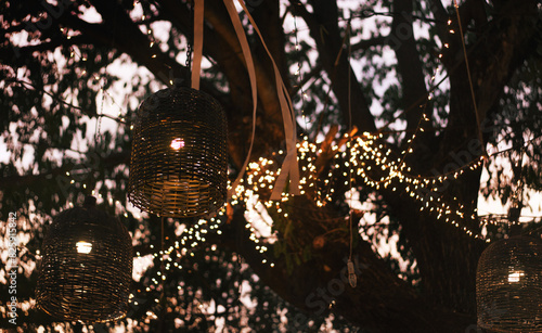 Decoration rattan lamp on tree in wedding ceremony