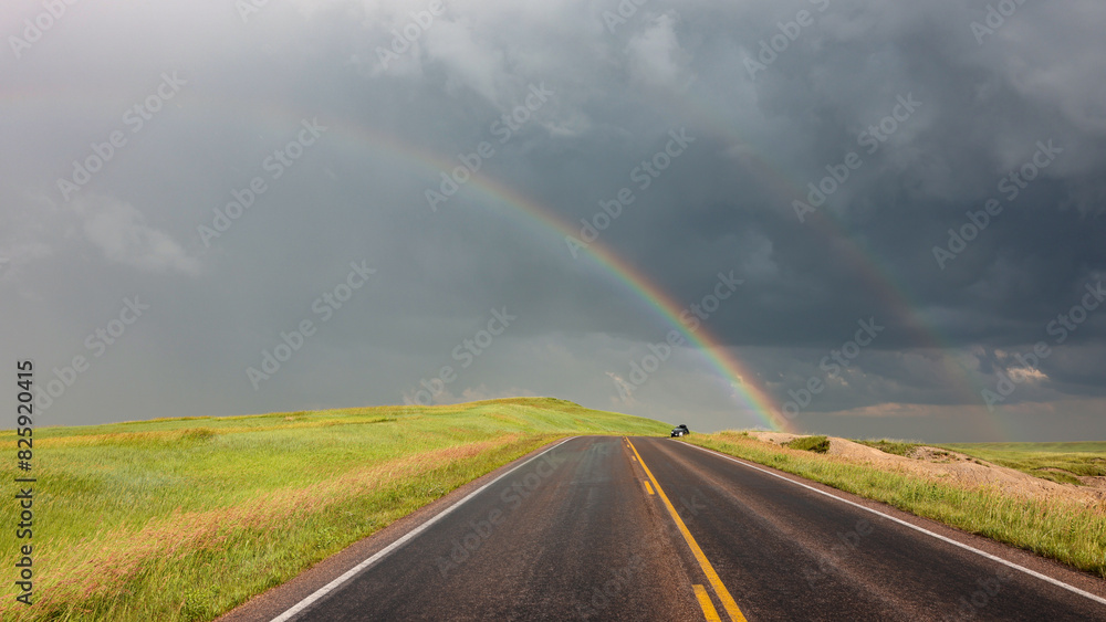 Double rainbow over the prairie in Badlands National Park after a summer storm, South Dakota	