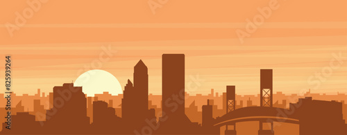 Brown panoramic poster of the city skyline with misty background buildings, sunrise, clouds and mountains of JACKSONVILLE, UNITED STATES