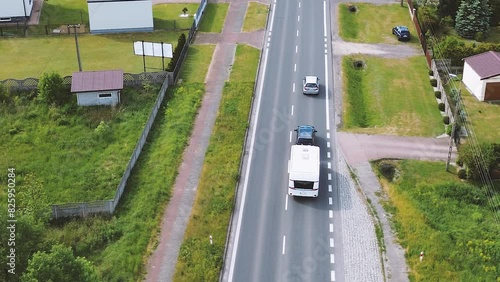 Car with camper on highway. Scenic aerial view. Summer travel adventure