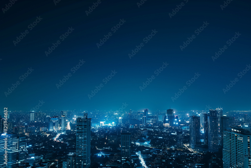 City Skyline at Night: Aerial View of Illuminated Skyscrapers City Skyline at Night: Aerial View of Illuminated Skyscrapers