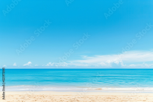 Sunlit Beach with Blue Sky and Ocean View