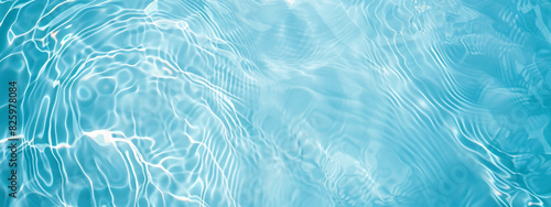Ripples and light reflections on clear blue water surface. Abstract summer banner background Water waves in sunlight with copy space Cosmetic moisturizer micellar toner emulsion photo