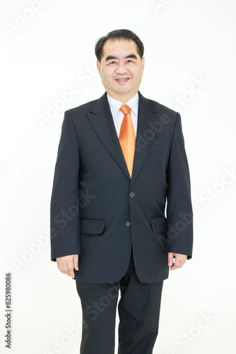 Asian senior businessman, an old man with black suit orange necktie, feel happy, smiling, good health isolated on white background. Concept for senior business successful professional.