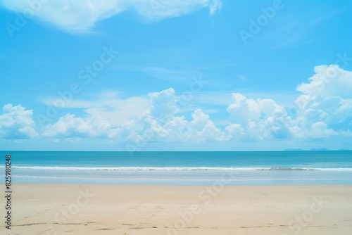Sunlit Beach with Blue Sky and Ocean View
