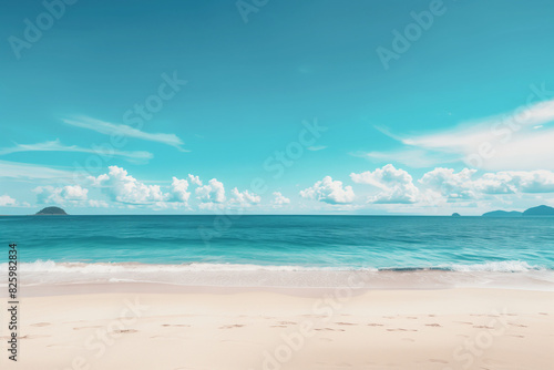 Sunlit Beach with Blue Sky and Ocean View