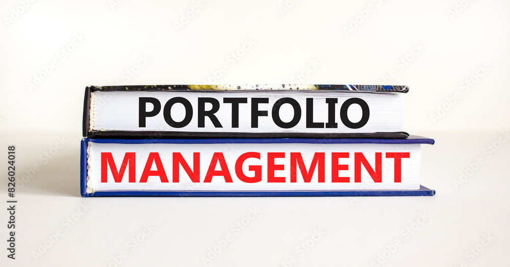 Obraz premium Portfolio management symbol. Concept words Portfolio management on beautiful books. Beautiful white paper background. Business Portfolio management concept. Copy space.