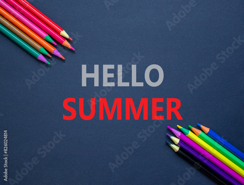 Hello summer symbol. Concept words Hello summer on beautiful black paper. Beautiful black paper background. Colored pencils. Business lifestyle Hello summer concept. Copy space.