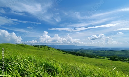 Landscape view of green grass on slope with blue sky   Generative AI