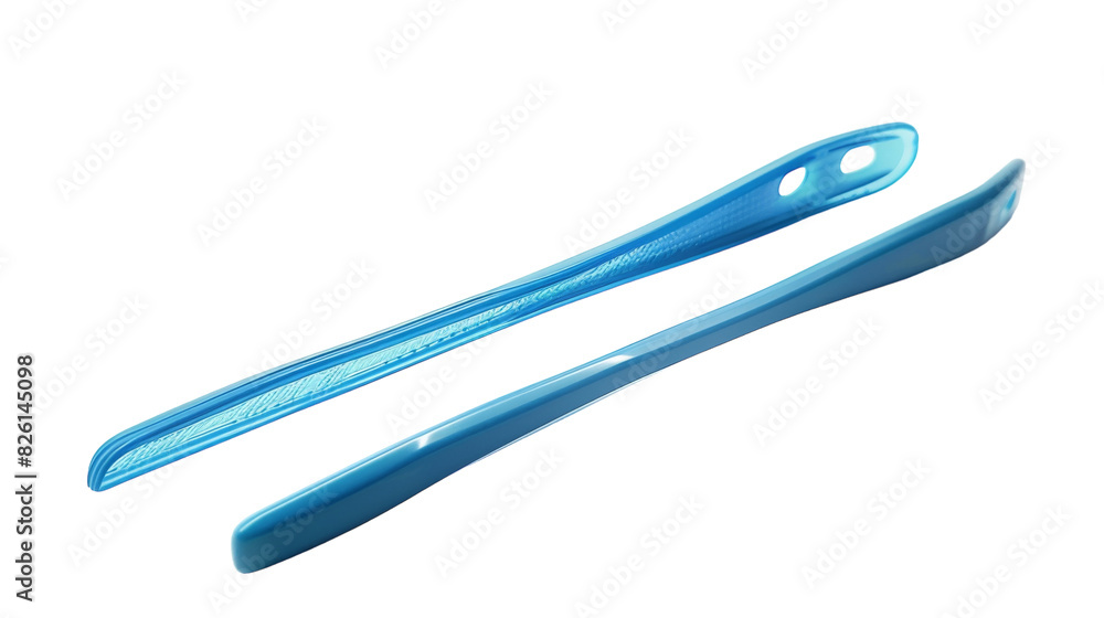 A pair of blue toothbrushes are displayed on a clean white background A pair of blue toothbrushes are displayed on a clean white background