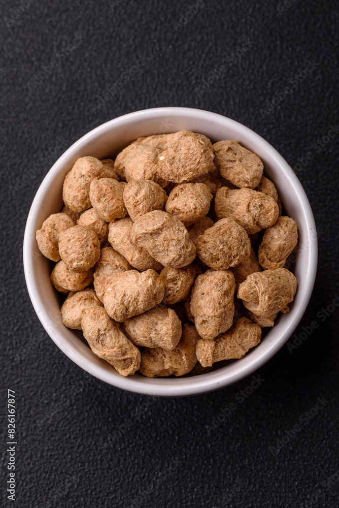 Dry soybean meat pellets, diet food for vegan and vegetarian cuisine Dry soybean meat pellets, diet food for vegan and vegetarian cuisine
