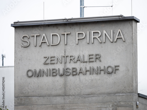 Zentraler Omnibusbahnhof in Pirna (central bus station) sign on the building of the public transport facility in the town. Mobility in Eastern Saxony.