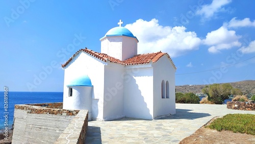 Exterior view of the charming Helgen Kalliopis Kirke, a small church overlooking the Aegean Sea in Kanala, Kythnos, Greece. photo