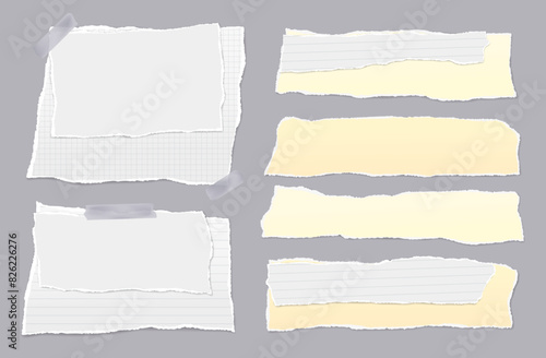 Set of torn white and yellow note paper pieces are on grey background for text or ad.
