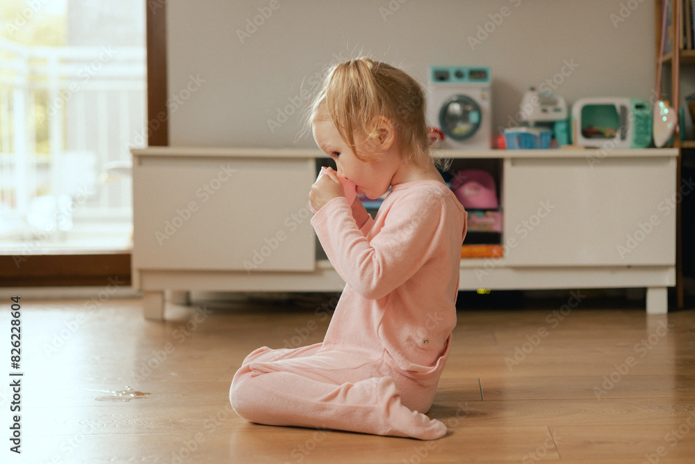 Portrait of happy baby playing with toys in playroom. Adorable two years old girl in playroom. Generation alpha concept Portrait of happy baby playing with toys in playroom. Adorable two years old girl in playroom. Generation alpha concept