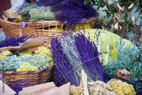 Fototapeta Naklejka Na Ścianę i Meble -  Sale of various spicy and aromatic herbs from a street stall. Lavender and other flowers.
