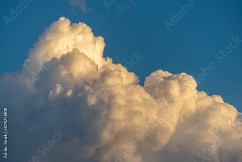 Closeup clouds in the sunset lights. Beautiful sunset clouds with dramatic light.