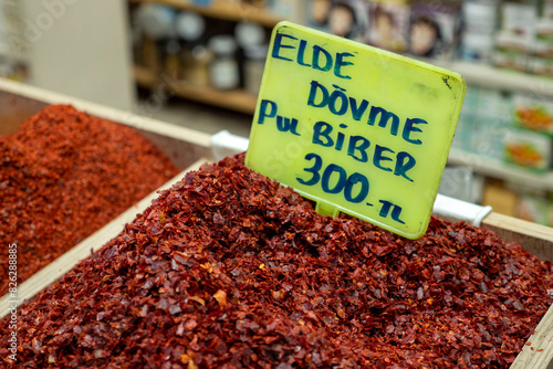 close-up coarsely ground red pepper, hot turkish dried pepper,