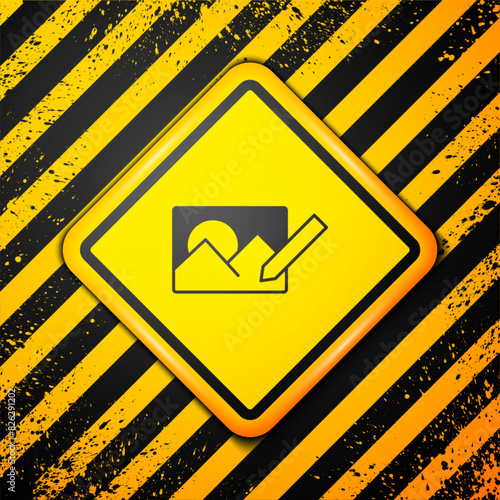 Black Photo retouching icon isolated on yellow background. Photographer, photography, retouch icon. Warning sign. Vector