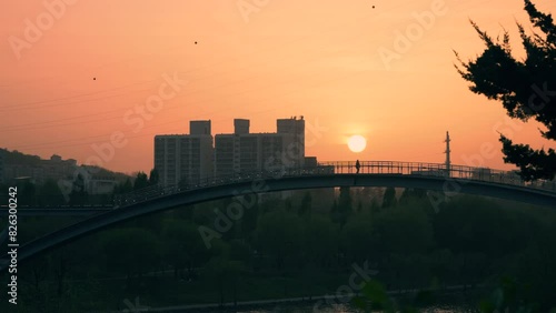 Seonyudo Footbridge Across Hangang River At Sunset In Seoul, South Korea. wide shot photo