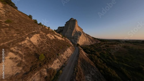 Drone footage of the scenic Path of Rockson a sunny day in Clavijo, La Rioja, Spain photo