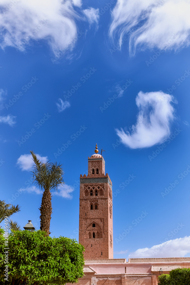 Fototapeta premium View of the Koutoubia, replica of the Giralda of Seville, from the Lalla Hasna gardens